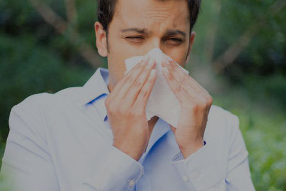 Person outdoors on a pollen-heavy morning
